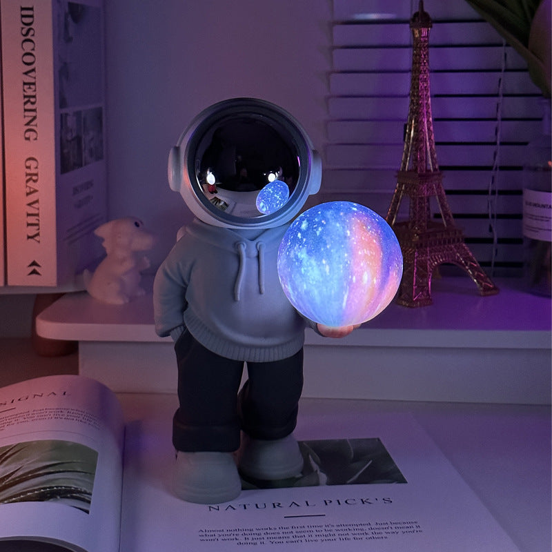 NNEDSZ Holding the dreamy starry sky (grey top + navy blue pants) Creative Astronaut Bluetooth Speaker with 3D Starry Sky Lighting, Portable Wireless Moon Lamp Speaker – Perfect Gift for Space Enthusiasts
